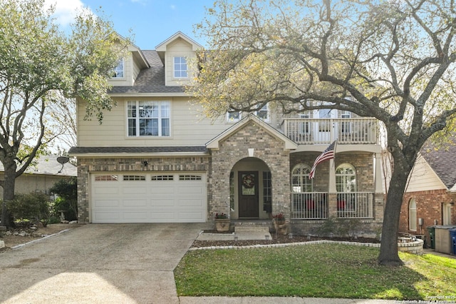 view of front of home featuring brick siding, concrete driveway, roof with shingles, a balcony, and an attached garage