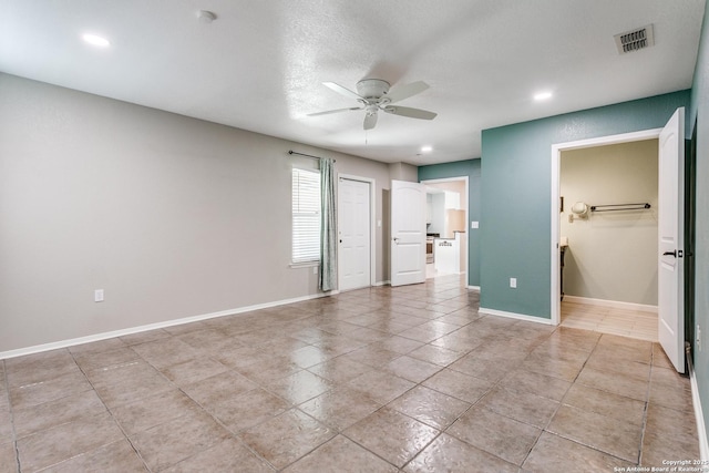 5918 Oak Country Way, San Antonio, TX 78247 - unfurnished bedroom with a ceiling fan, ensuite bathroom, baseboards, visible vents, and recessed lighting