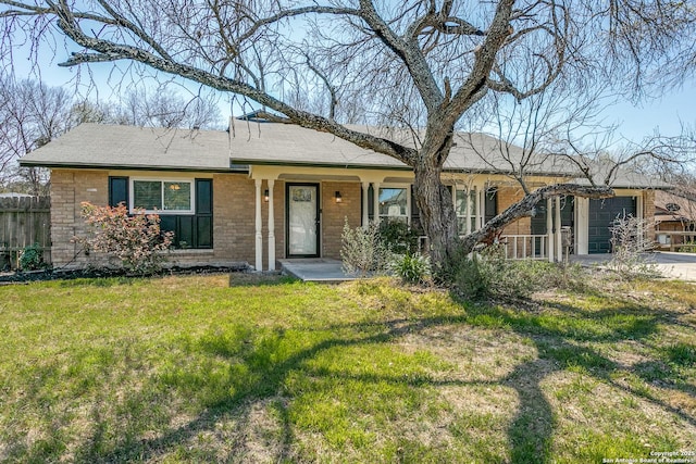 5918 Oak Country Way, San Antonio, TX 78247 - ranch-style home featuring brick siding, a garage, fence, and a front yard