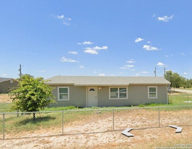 single story home featuring fence private yard