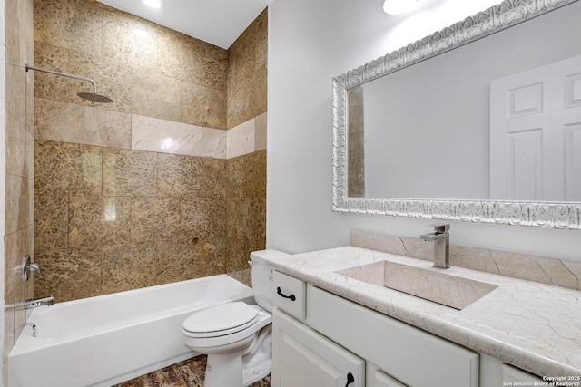 bathroom featuring toilet, shower / washtub combination, and vanity