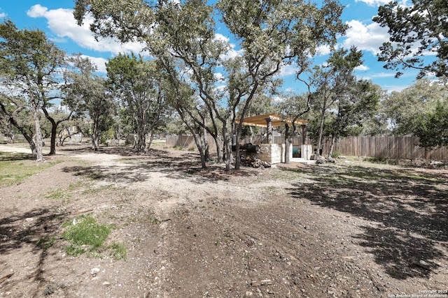 view of yard with fence