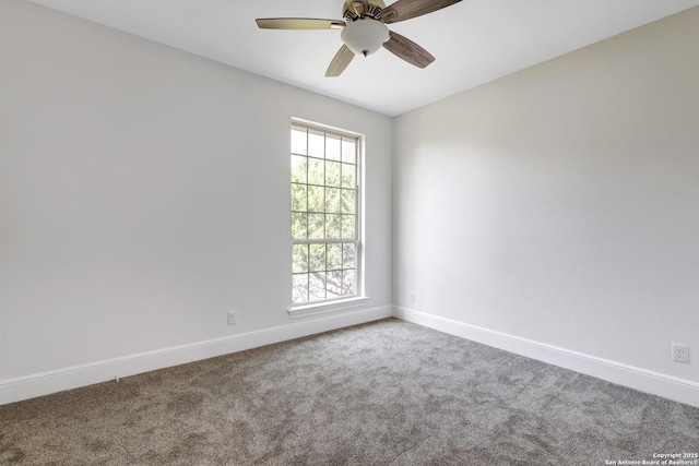 carpeted empty room with baseboards and ceiling fan