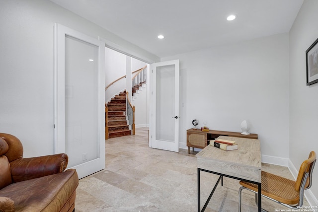 office space with recessed lighting, french doors, and baseboards