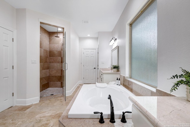 full bath with a stall shower, recessed lighting, baseboards, a bath, and vanity