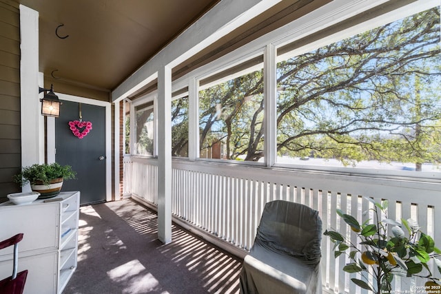 sunroom / solarium with a healthy amount of sunlight