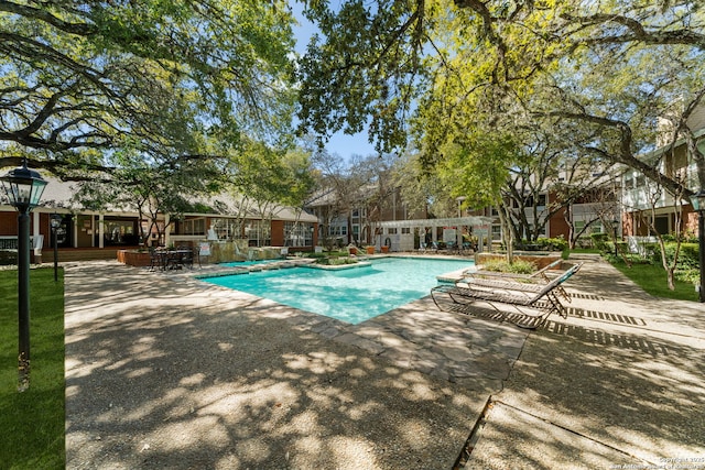 pool with a patio