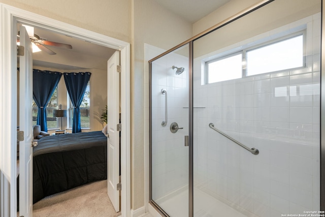 ensuite bathroom with a stall shower, ensuite bath, and ceiling fan