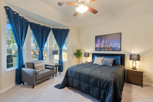 bedroom with a ceiling fan, baseboards, and carpet floors