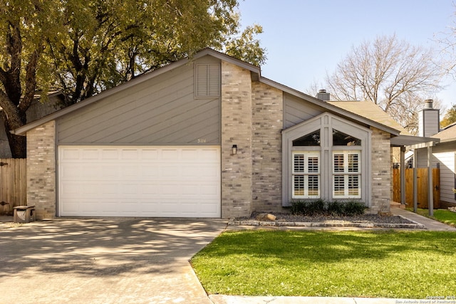 mid-century modern home with brick siding, fence, concrete driveway, a front yard, and a garage