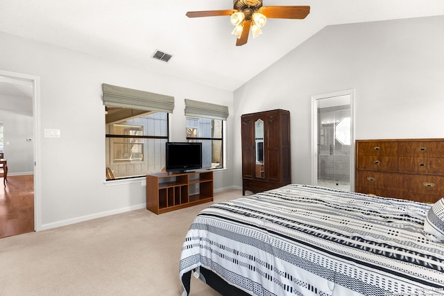 bedroom with visible vents, connected bathroom, baseboards, lofted ceiling, and carpet floors