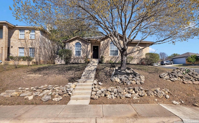 view of front of home featuring stucco siding