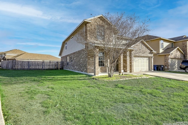 view of front of house featuring brick siding, fence, a front yard, a garage, and driveway