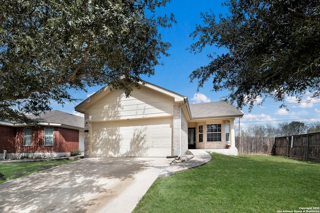 ranch-style house with a front yard, fence, driveway, an attached garage, and brick siding