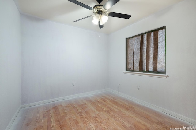 unfurnished room with light wood-type flooring, baseboards, and ceiling fan