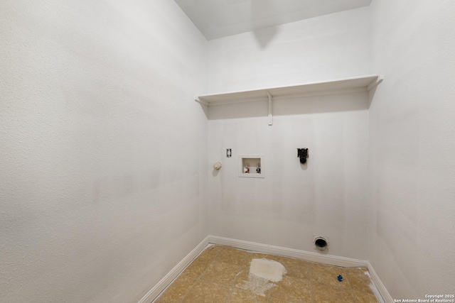 laundry room featuring laundry area, gas dryer hookup, baseboards, and washer hookup