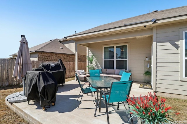 view of patio / terrace featuring outdoor dining space and fence