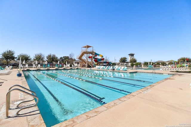 community pool featuring a patio area