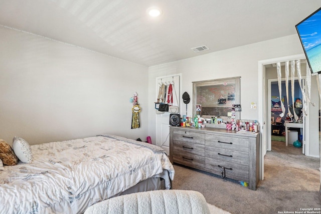 carpeted bedroom with visible vents