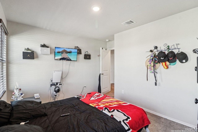 bedroom featuring carpet, visible vents, and baseboards