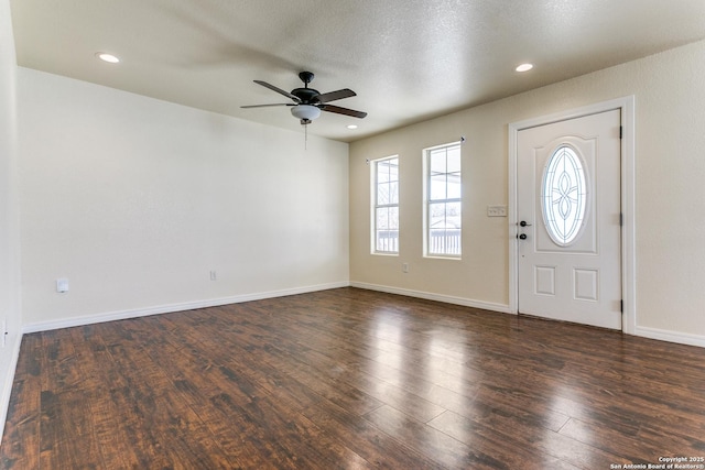 entryway with a textured ceiling, dark wood-style floors, recessed lighting, baseboards, and ceiling fan