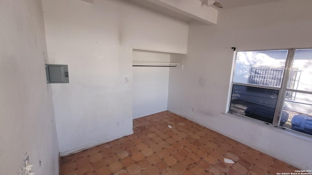 empty room with tile patterned floors