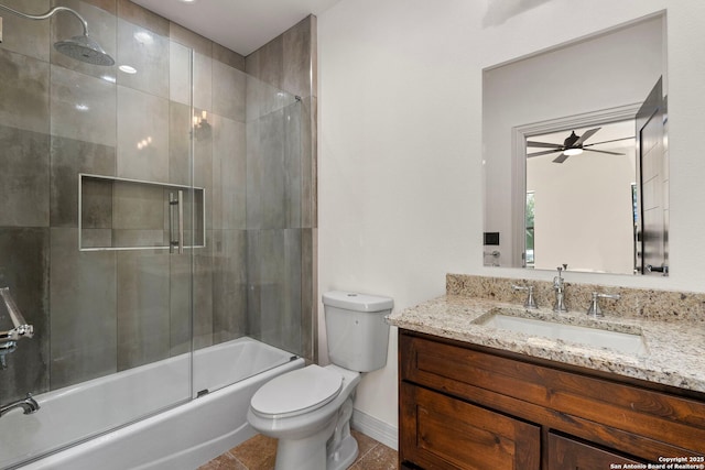 bathroom with vanity, toilet, combined bath / shower with glass door, and tile patterned flooring