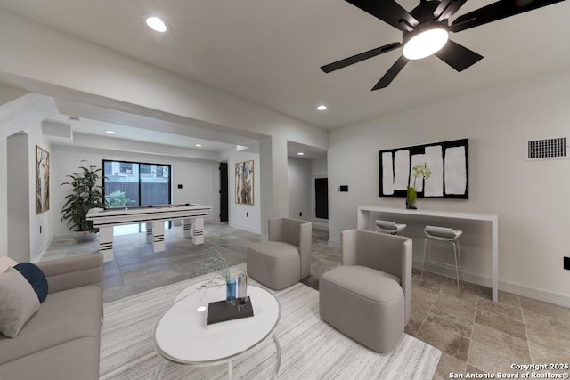 living room with recessed lighting, visible vents, baseboards, and ceiling fan