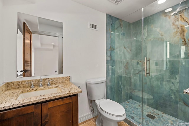 bathroom with a marble finish shower, visible vents, toilet, and vanity