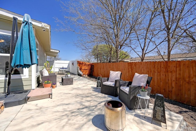 view of patio featuring a fenced backyard