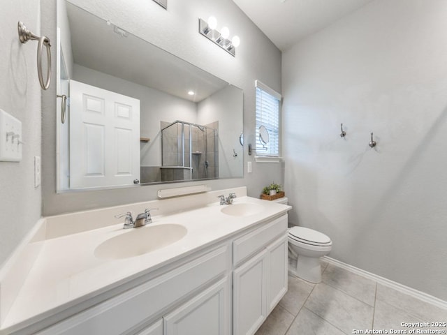 full bath featuring tile patterned flooring, a shower stall, double vanity, and a sink