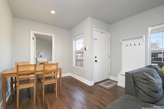 dining area featuring dark wood-type flooring, recessed lighting, baseboards, and a wealth of natural light