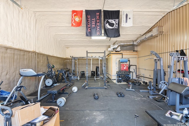 exercise room with a garage