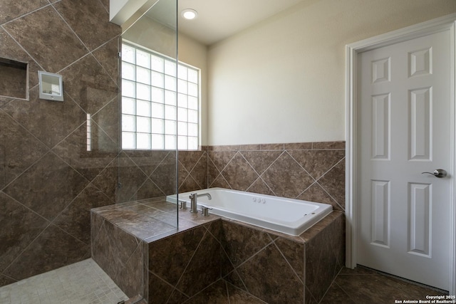 bathroom with a garden tub