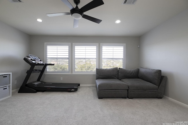 workout room featuring visible vents, baseboards, carpet, and a ceiling fan