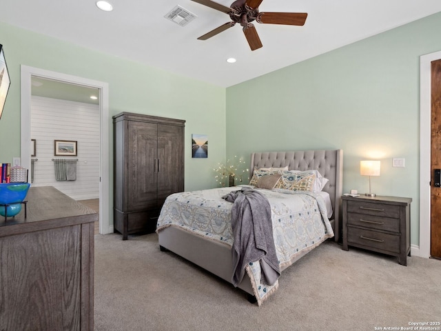 bedroom with recessed lighting, visible vents, light carpet, and ceiling fan