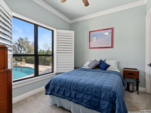 bedroom featuring ceiling fan, crown molding, baseboards, and carpet floors