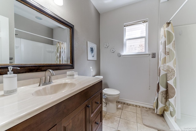 bathroom with tile patterned flooring, baseboards, toilet, a shower with shower curtain, and vanity