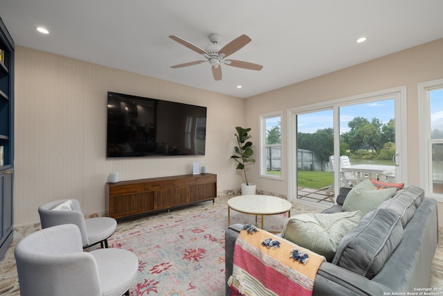 living area with recessed lighting and ceiling fan