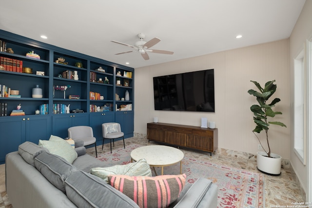 living area with recessed lighting and a ceiling fan