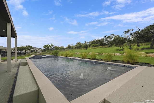 view of pool with a patio and a pool with connected hot tub