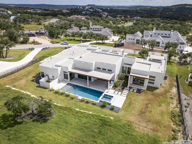 drone / aerial view with a residential view