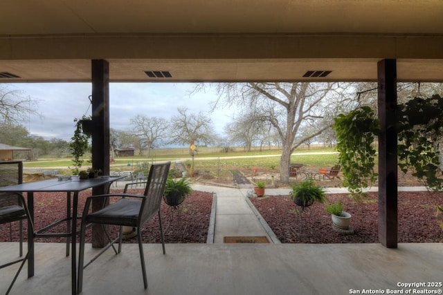 view of patio featuring visible vents