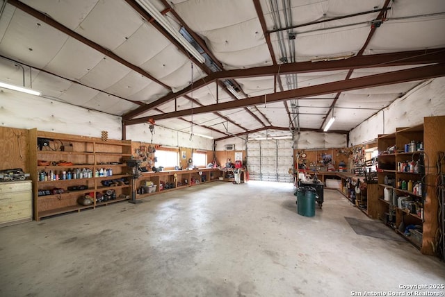 garage with a workshop area