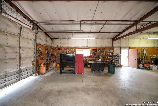 garage with a workshop area