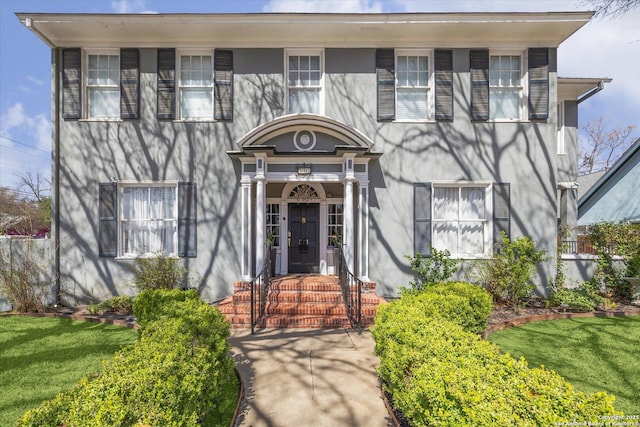 view of front of property featuring stucco siding