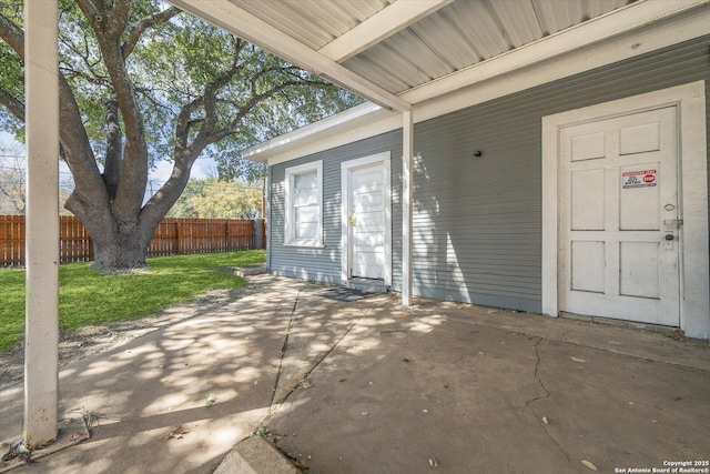 view of patio / terrace featuring fence