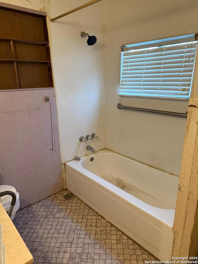 full bathroom with shower / washtub combination