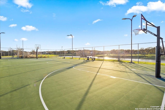 view of sport court with community basketball court and fence