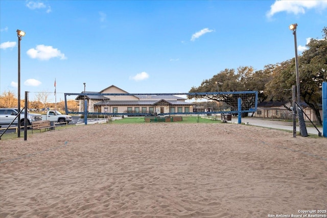 view of property's community featuring volleyball court